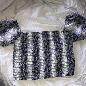 Snake skin printed off the shoulder crop top in the size large.